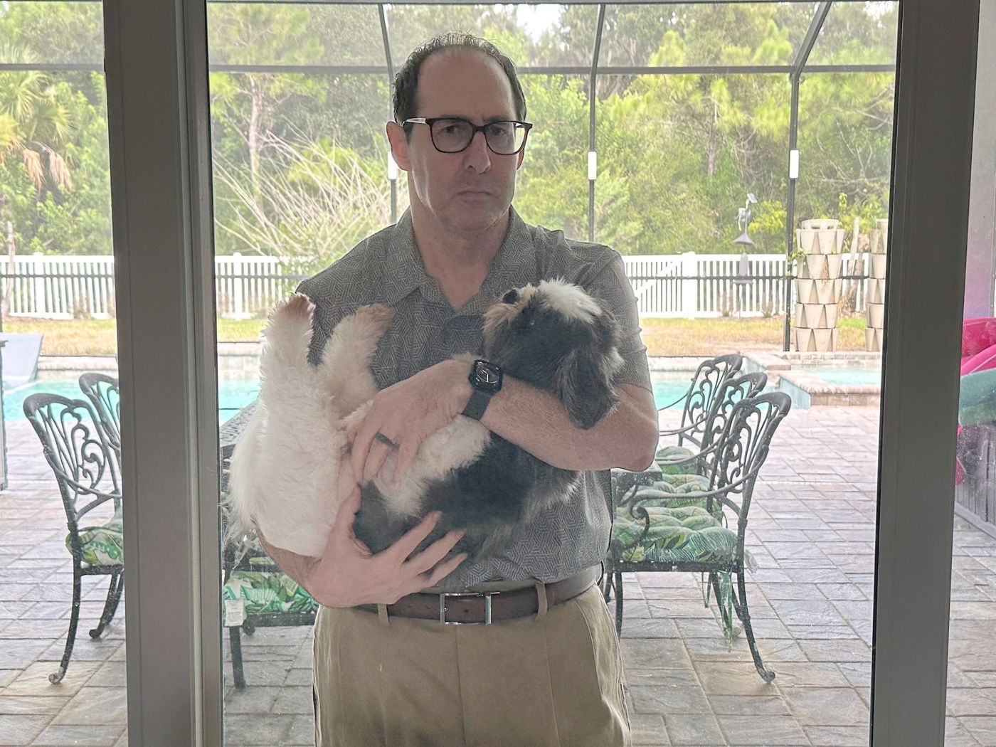 Phil Weiss holding one of the dogs